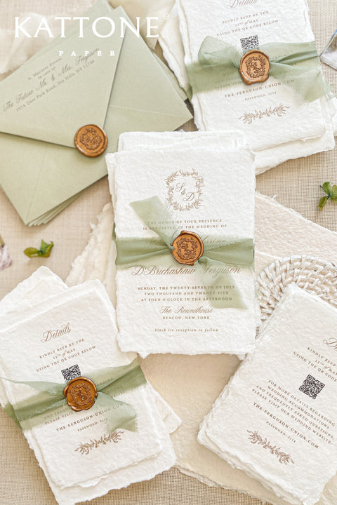 Announce your marriage with a romantic and modern touch that is also kind to the planet. This exquisite wedding invites suite features elegant modern calligraphy printed on luxurious handmade paper with a delicate deckle edge. As an eco-friendly choice, these invites combine contemporary design with sustainable craftsmanship, ensuring your stationery is as beautiful as it is responsible. The result is a stunning and truly romantic set of wedding stationery.