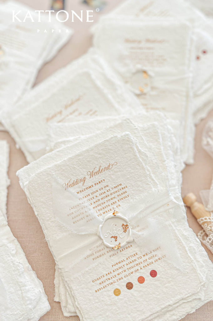 Coordinated wedding stationery suite including invitation, welcome cards and details inserts with cohesive design elements.
