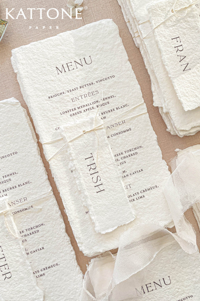 Premium wedding reception menu suite designed with deckled edge cotton paper, clean typography, and refined monochromatic styling.