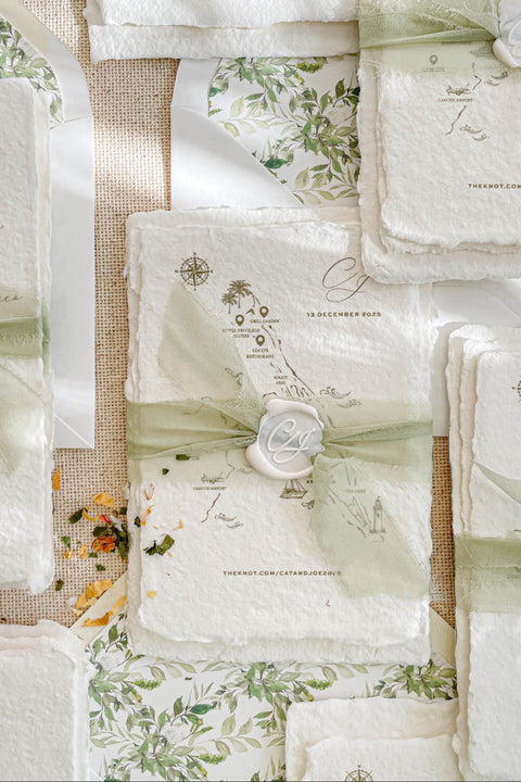 Announce your special day with the serene and natural beauty of these handmade paper wedding invitations. Perfect for a garden wedding or an outdoor celebration, this suite combines the luxurious, tactile feel of artisan paper with a delicate botanical design. The result is a truly romantic set of wedding stationery that will enchant your guests and beautifully set the tone for your special day.