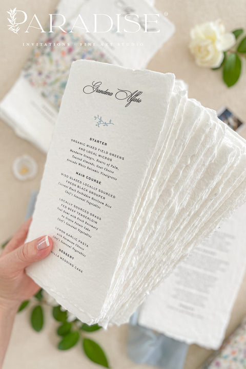 Add a touch of botanical beauty and fine art elegance to your event with our handmade paper wedding menus, crafted from 100% cotton rag paper with delicately torn deckled edges. Each menu features a vibrant floral vellum wrap paired with a soft silk ribbon and wax seal, creating an exquisite balance between organic texture and romantic detail. The minimalist typography allows the floral design to shine, making these menus perfect for garden weddings, spring celebrations and outdoor receptions.
