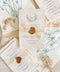 Announce your marriage with the perfect blend of natural texture and refined elegance with this custom handmade paper wedding invites suite. Designed for a boho rustic feel, this set also features a custom elegant aesthetic, making it ideal for a relaxed yet sophisticated celebration. Each invitation is a true work of art, with the luxurious feel of handmade paper providing a unique and personal touch that your guests will adore.
