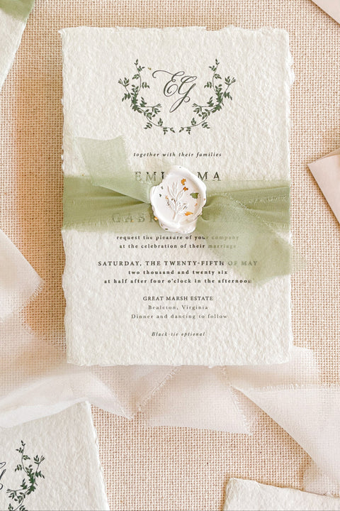 Announce your special day with the serene and natural beauty of these handmade paper wedding invitations. Perfect for a garden wedding or an outdoor celebration, this suite combines the luxurious, tactile feel of artisan paper with a delicate botanical design. The result is a truly romantic set of wedding stationery that will enchant your guests and beautifully set the tone for your special day.