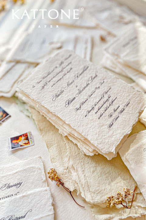 Timeless, refined, and elegantly understated - these handmade paper wedding invitations embody the essence of fine art craftsmanship. Printed on luxury cotton handmade paper with naturally deckled edges, each invitation feels soft, organic, and beautifully textured, creating a sense of warmth and authenticity from the very first touch. Each suite is wrapped in a silk ribbon and finished with wax seal monogram, adding a bespoke touch that symbolizes intimacy and attention to detail.
