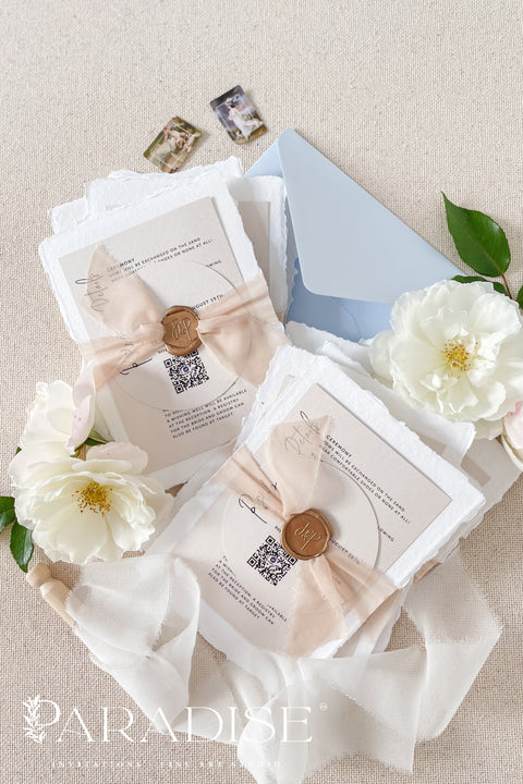 Celebrate your love story with elegance and artistry through our handmade wedding invitations, beautifully crafted from 100% cotton deckled-edge paper and finished with blush silk ribbon and a bronze wax seal. The soft tones of sage green and blush bring warmth and natural beauty to your wedding stationery, making it perfect for modern garden, romantic outdoor, or destination weddings.