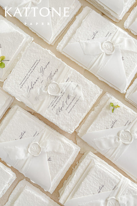 Introduce your wedding with the timeless and intimate feel of the Romantic Handmade Wedding Invitation. Each invite is a beautiful work of fine art, crafted on luxurious, artisan handmade paper with a natural deckle edge, giving it an organic, delicate texture that your guests will love to touch. The combination of handcrafted paper and a personalized, romantic design creates a bespoke feel that sets a deeply meaningful tone for your celebration.