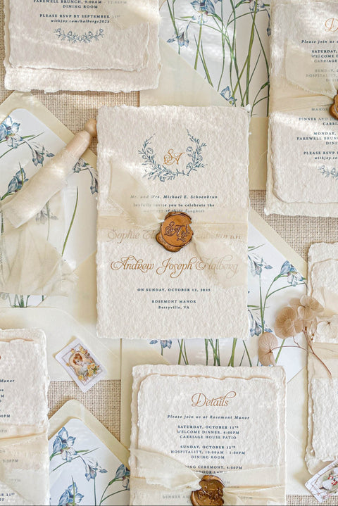 Announce your marriage with the perfect blend of natural texture and refined elegance with this custom handmade paper wedding invites suite. Designed for a boho rustic feel, this set also features a custom elegant aesthetic, making it ideal for a relaxed yet sophisticated celebration. Each invitation is a true work of art, with the luxurious feel of handmade paper providing a unique and personal touch that your guests will adore.