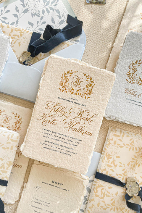 Announce your marriage with a romantic and modern touch that is also kind to the planet. This exquisite wedding invites suite features elegant modern calligraphy printed on luxurious handmade paper with a delicate deckle edge. As an eco-friendly choice, these invites combine contemporary design with sustainable craftsmanship, ensuring your stationery is as beautiful as it is responsible. The result is a stunning and truly romantic set of wedding stationery.