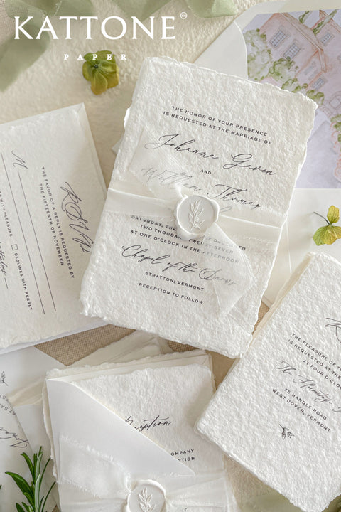 Introduce your wedding with the timeless and intimate feel of the Romantic Handmade Wedding Invitation. Each invite is a beautiful work of fine art, crafted on luxurious, artisan handmade paper with a natural deckle edge, giving it an organic, delicate texture that your guests will love to touch. The combination of handcrafted paper and a personalized, romantic design creates a bespoke feel that sets a deeply meaningful tone for your celebration.