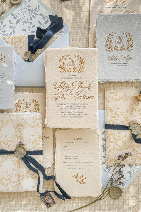 Announce your marriage with a romantic and modern touch that is also kind to the planet. This exquisite wedding invites suite features elegant modern calligraphy printed on luxurious handmade paper with a delicate deckle edge. As an eco-friendly choice, these invites combine contemporary design with sustainable craftsmanship, ensuring your stationery is as beautiful as it is responsible. The result is a stunning and truly romantic set of wedding stationery.