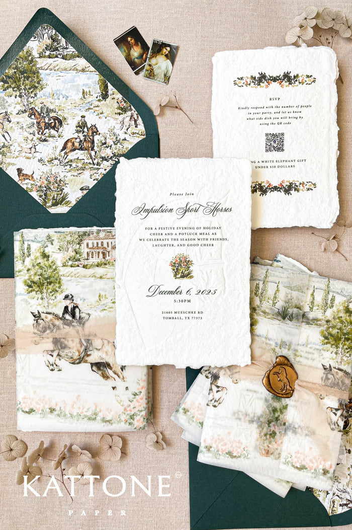 Embossed handmade paper wedding invitations with custom watercolor illustration, vellum wrap, and deckle edge cotton paper.