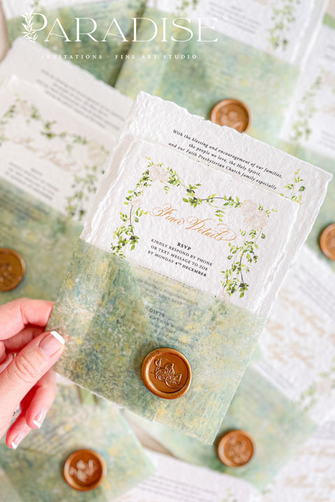 This exquisite wedding invitation set offers a blend of natural elegance and personalized artistry. Perfect for a garden green wedding, these beautiful custom elegant invites are printed on luxurious handmade deckled edge paper, which provides a rich, tactile feel and a truly unique finish. The result is a stationery suite that is both sophisticated and harmonious, beautifully capturing the essence of your special day.