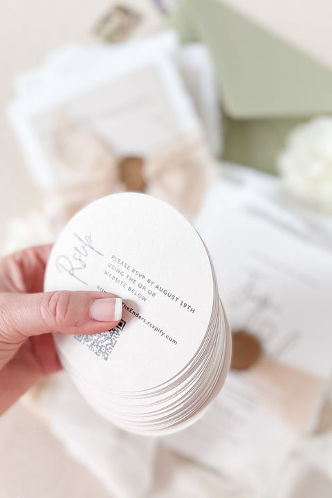 Celebrate your love story with elegance and artistry through our handmade wedding invitations, beautifully crafted from 100% cotton deckled-edge paper and finished with blush silk ribbon and a bronze wax seal. The soft tones of sage green and blush bring warmth and natural beauty to your wedding stationery, making it perfect for modern garden, romantic outdoor, or destination weddings.