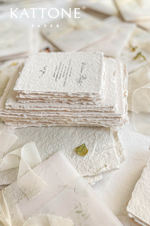 Announce your special day with the serene beauty of this wedding invitation set. Perfect for a garden wedding, each suite features a custom, hand-painted watercolor wedding venue illustration that beautifully captures the charm of your location. Printed on luxurious handmade paper, the invitations are finished with a personalized wax seal, adding a tactile and opulent detail that your guests will adore.