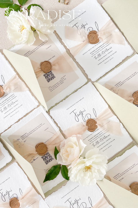 Celebrate your love story with elegance and artistry through our handmade wedding invitations, beautifully crafted from 100% cotton deckled-edge paper and finished with blush silk ribbon and a bronze wax seal. The soft tones of sage green and blush bring warmth and natural beauty to your wedding stationery, making it perfect for modern garden, romantic outdoor, or destination weddings.