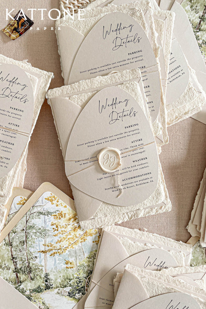 Modern arch-shaped wedding details cards create a sophisticated and unique design element while adding softness and visual interest to the suite.