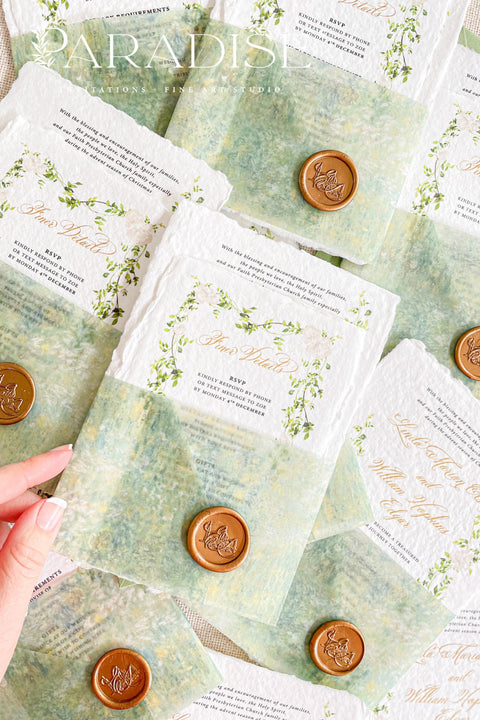 This exquisite wedding invitation set offers a blend of natural elegance and personalized artistry. Perfect for a garden green wedding, these beautiful custom elegant invites are printed on luxurious handmade deckled edge paper, which provides a rich, tactile feel and a truly unique finish. The result is a stationery suite that is both sophisticated and harmonious, beautifully capturing the essence of your special day.