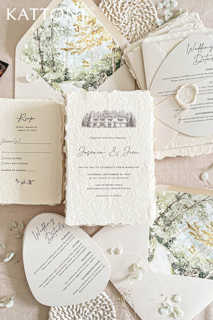 Luxury handmade paper wedding invitation suite featuring deckled edge cotton paper, custom scenic envelope liners, arch-shaped details cards, soft neutral envelopes, and romantic fine art wedding stationery styling.