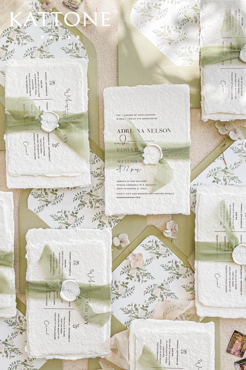 This exquisite wedding invitations suite offers a blend of natural elegance and modern sophistication. Perfect for a garden green wedding, these beautiful invites feature a chic, contemporary design printed on luxurious handmade cotton paper. The suite includes a beautifully designed wedding timeline, guiding your guests through your special day with a personal and artistic touch, all wrapped in a fresh and modern aesthetic.