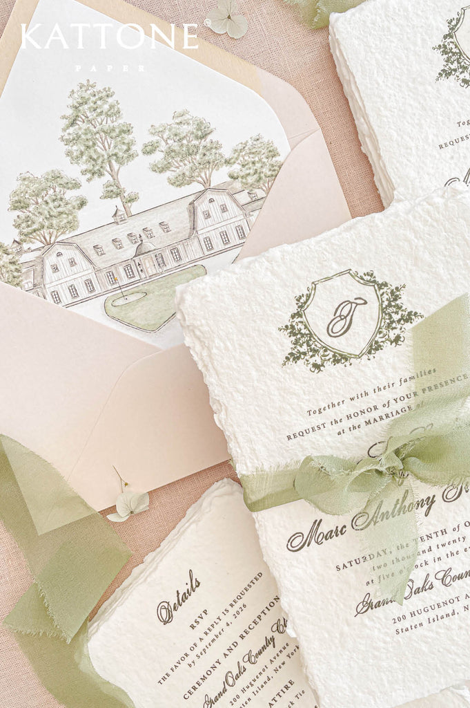 Custom blush wedding envelopes with illustrated estate venue liners featuring detailed architectural artwork in soft green and neutral tones, creating a cohesive and elevated luxury stationery presentation.