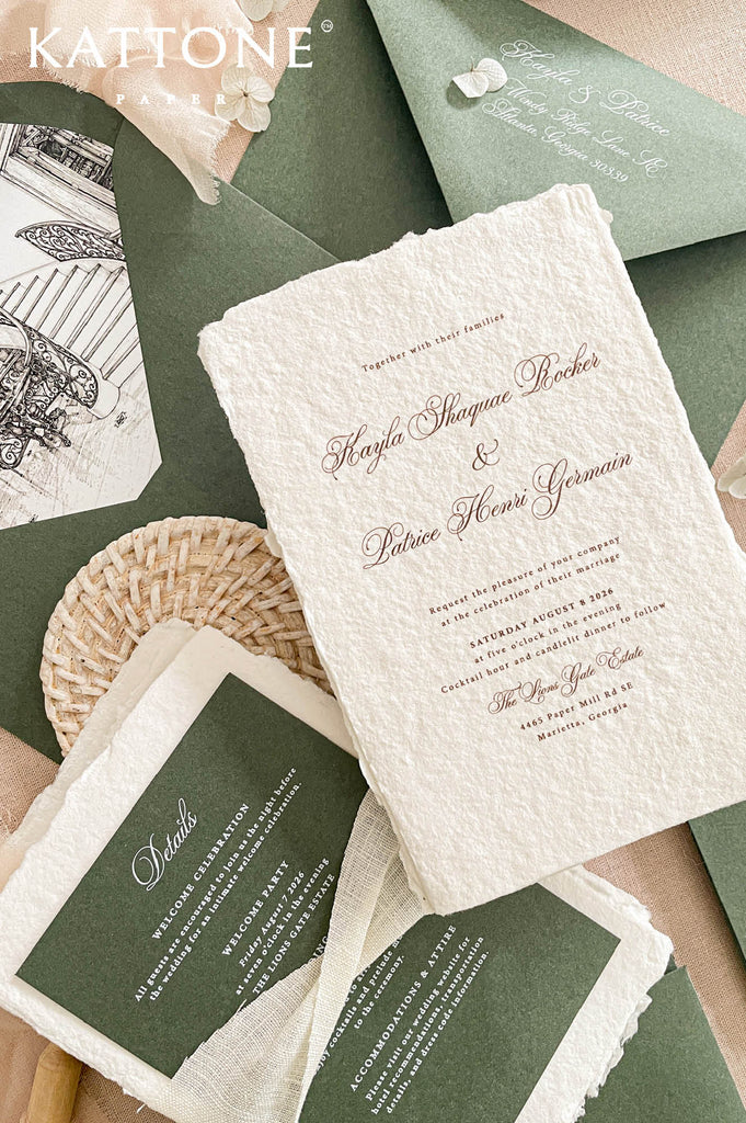 Elegant handmade paper wedding invitation with deckled edges featuring refined calligraphy typography and timeless romantic styling.