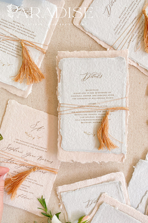 Invite your guests to your special day with the whimsical and elegant touch of this handmade paper wedding invites suite. Perfect for a garden wedding, these invitations feature a unique tassel detail, adding a pop of color and charm. The suite is printed on custom colored handmade paper, providing a rich, organic texture that sets a warm and inviting tone for your celebration.