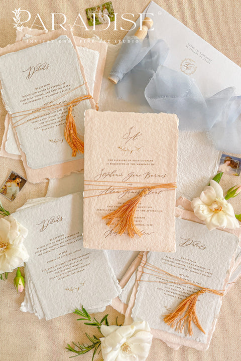 Invite your guests to your special day with the whimsical and elegant touch of this handmade paper wedding invites suite. Perfect for a garden wedding, these invitations feature a unique tassel detail, adding a pop of color and charm. The suite is printed on custom colored handmade paper, providing a rich, organic texture that sets a warm and inviting tone for your celebration.
