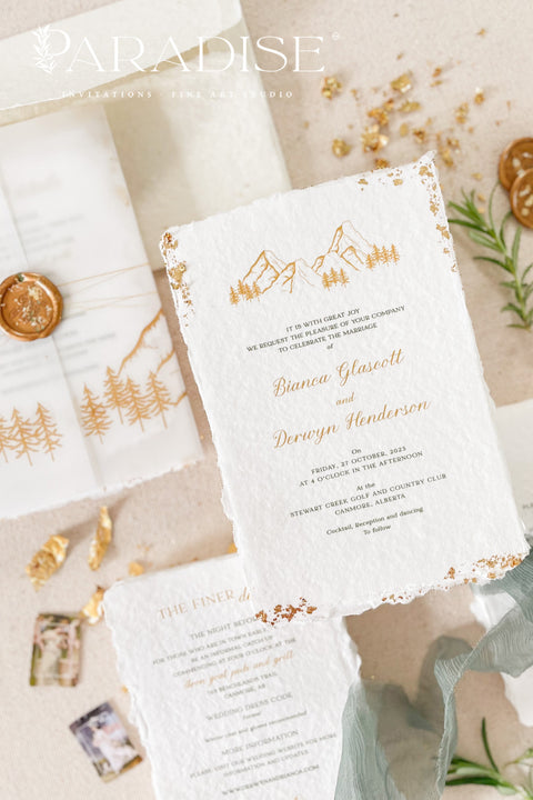 Invite your guests to your special day with the perfect blend of natural beauty and refined elegance. These unique mountain invites are printed on luxurious, eco-friendly handmade paper, giving them a rich, organic texture. A delicate golden leaf detail adds a touch of understated luxury, perfectly complementing the rugged charm of a mountain landscape. This rustic chic stationery is ideal for a nature-inspired wedding that is both sophisticated and environmentally conscious.