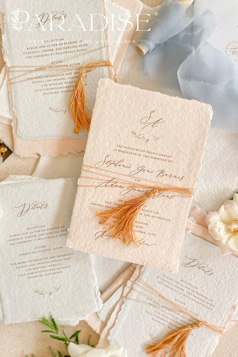 Invite your guests to your special day with the whimsical and elegant touch of this handmade paper wedding invites suite. Perfect for a garden wedding, these invitations feature a unique tassel detail, adding a pop of color and charm. The suite is printed on custom colored handmade paper, providing a rich, organic texture that sets a warm and inviting tone for your celebration.