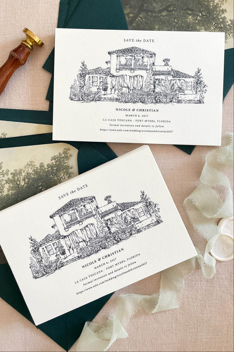 Save the date card with custom venue illustration of European villa printed on luxury cardstock with elegant serif typography and deep green envelopes.