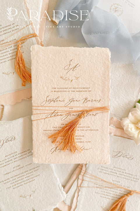 Invite your guests to your special day with the whimsical and elegant touch of this handmade paper wedding invites suite. Perfect for a garden wedding, these invitations feature a unique tassel detail, adding a pop of color and charm. The suite is printed on custom colored handmade paper, providing a rich, organic texture that sets a warm and inviting tone for your celebration.