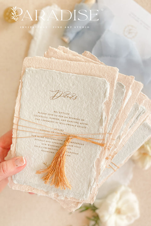 Invite your guests to your special day with the whimsical and elegant touch of this handmade paper wedding invites suite. Perfect for a garden wedding, these invitations feature a unique tassel detail, adding a pop of color and charm. The suite is printed on custom colored handmade paper, providing a rich, organic texture that sets a warm and inviting tone for your celebration.