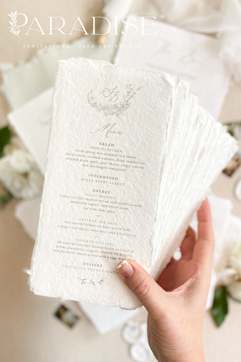 Bring timeless refinement to your celebration with our handmade paper wedding menus, beautifully complemented by matching table numbers and bar signs. Each piece is crafted from 100% cotton rag paper with naturally torn deckled edges, exuding fine art elegance and artisanal charm. The soft texture, delicate typography, and minimal botanical details create a cohesive and luxurious table presentation. Perfect for romantic, garden, or fine art weddings, these menus seamlessly blend style and craftsmanship.