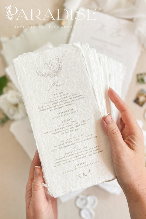 Bring timeless refinement to your celebration with our handmade paper wedding menus, beautifully complemented by matching table numbers and bar signs. Each piece is crafted from 100% cotton rag paper with naturally torn deckled edges, exuding fine art elegance and artisanal charm. The soft texture, delicate typography, and minimal botanical details create a cohesive and luxurious table presentation. Perfect for romantic, garden, or fine art weddings, these menus seamlessly blend style and craftsmanship.