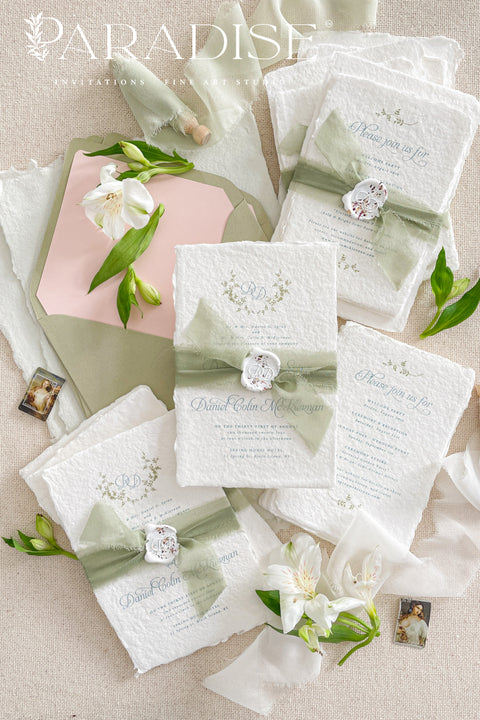 Announce your marriage with a romantic and personalized touch with this beautiful wedding invitations suite. Designed for a summer wedding, this set combines the warmth of the season with the timeless elegance of a custom monogram. Printed on luxurious, artisan handmade cotton paper, these invites offer a truly tactile and refined experience for your guests, perfectly setting a romantic and heartfelt tone for your celebration.