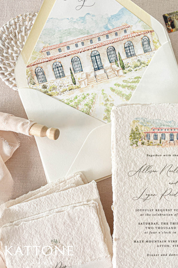 Custom wedding envelope liners featuring a delicate watercolor venue illustration of a vineyard estate with soft greenery and architectural details.