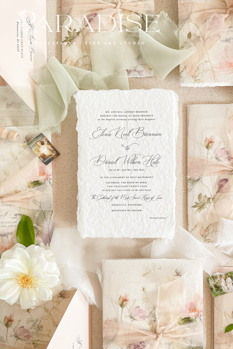Announce your special day with timeless, heartfelt style. This botanical wedding invitation suite is crafted on our signature, luxurious handmade paper, made from 100% recycled cotton rag. The unique deckled edges and soft texture provide an artisan feel that is both rustic and elegant, setting a deeply romantic tone for your ceremony. Featuring delicate botanical illustrations, each invite is an eco-friendly choice that leaves a lasting impression on your guests.