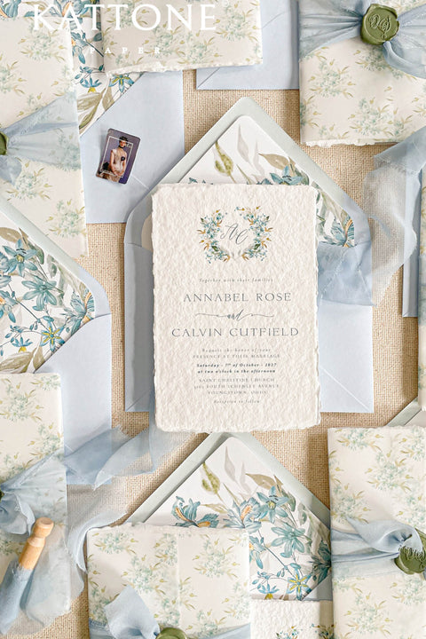 Set a sophisticated and thoughtful tone for your coastal celebration with these unique wedding invites. Perfect for a beach wedding, this suite features a classic navy theme with a beautifully designed wedding timeline to guide your guests through your special day. The elegant calligraphy design adds a touch of classic romance, while the eco-conscious materials ensure your stationery is a beautiful and responsible choice for your special day.