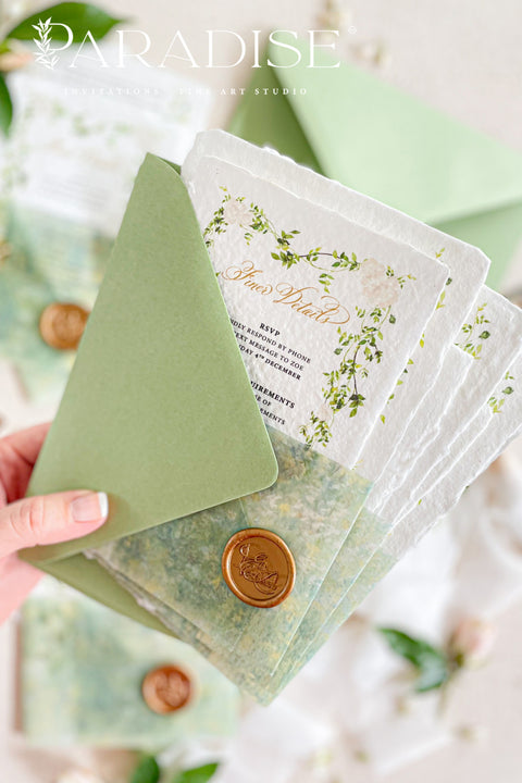 This exquisite wedding invitation set offers a blend of natural elegance and personalized artistry. Perfect for a garden green wedding, these beautiful custom elegant invites are printed on luxurious handmade deckled edge paper, which provides a rich, tactile feel and a truly unique finish. The result is a stationery suite that is both sophisticated and harmonious, beautifully capturing the essence of your special day.