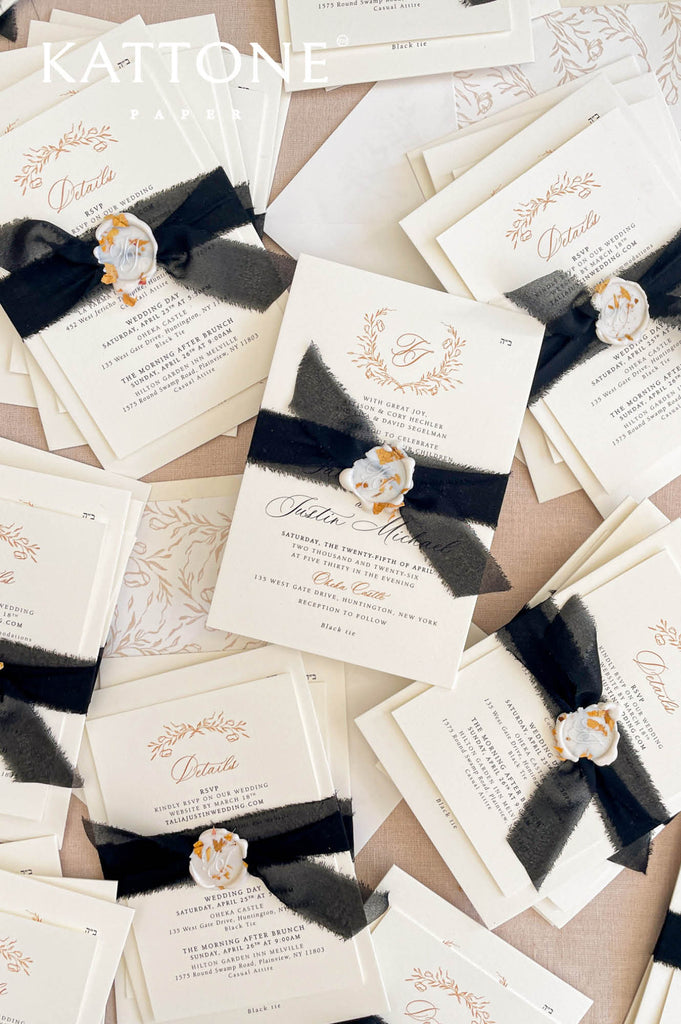 Complete fine art wedding invitation suite with details card, envelopes, ribbon, and wax seal