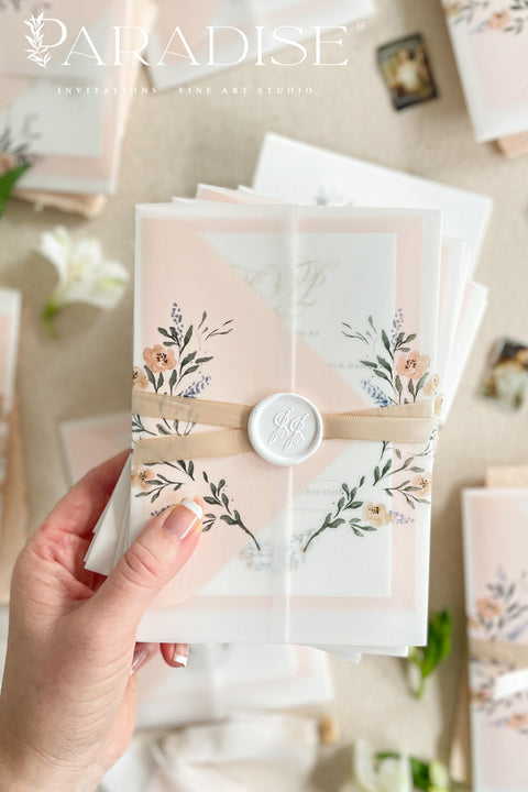 This exquisite wedding invitation set offers a blend of timeless sophistication and eco-conscious artistry. Each invite features a bespoke custom watercolor crest, hand-painted to capture your unique love story. The crest is printed on your choice of either smooth, premium paper or on our beautiful sustainable deckled edge fine art stationery, a handcrafted paper with a beautiful, tactile finish.