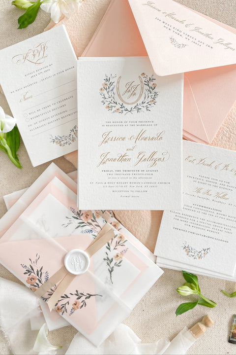 This exquisite wedding invitation set offers a blend of timeless sophistication and eco-conscious artistry. Each invite features a bespoke custom watercolor crest, hand-painted to capture your unique love story. The crest is printed on your choice of either smooth, premium paper or on our beautiful sustainable deckled edge fine art stationery, a handcrafted paper with a beautiful, tactile finish.
