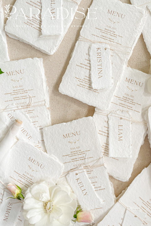 Bring timeless elegance to your table with our handmade paper wedding menus, crafted from 100% cotton rag paper and finished with natural deckled edges for a romantic fine-art touch. Featuring minimalist typography, warm neutral tones, and custom guest name tags tied with natural twine, these menus are the perfect blend of sophistication and organic charm. Each piece is designed to elevate your event’s presentation - ideal for weddings, rehearsal dinners, elopements, and styled shoots.