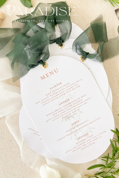 Make a refined statement at your reception with our double arch wedding menus, a modern take on classic elegance. These menus feature a unique double-arched silhouette, expertly printed on luxury thick cardstock for a soft yet structured feel. The minimalist layout highlights elegant typography in warm, contemporary tones, while a silk chiffon ribbon and gold grommet detail add a sophisticated finishing touch.