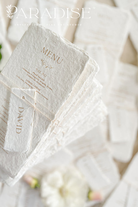 Bring timeless elegance to your table with our handmade paper wedding menus, crafted from 100% cotton rag paper and finished with natural deckled edges for a romantic fine-art touch. Featuring minimalist typography, warm neutral tones, and custom guest name tags tied with natural twine, these menus are the perfect blend of sophistication and organic charm. Each piece is designed to elevate your event’s presentation - ideal for weddings, rehearsal dinners, elopements, and styled shoots.