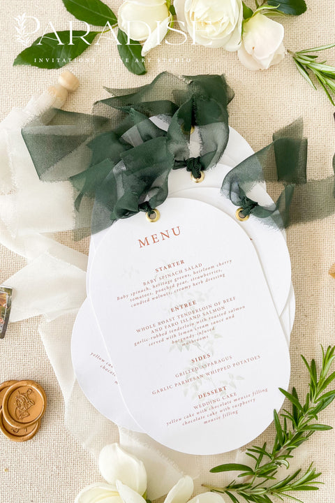 Make a refined statement at your reception with our double arch wedding menus, a modern take on classic elegance. These menus feature a unique double-arched silhouette, expertly printed on luxury thick cardstock for a soft yet structured feel. The minimalist layout highlights elegant typography in warm, contemporary tones, while a silk chiffon ribbon and gold grommet detail add a sophisticated finishing touch.