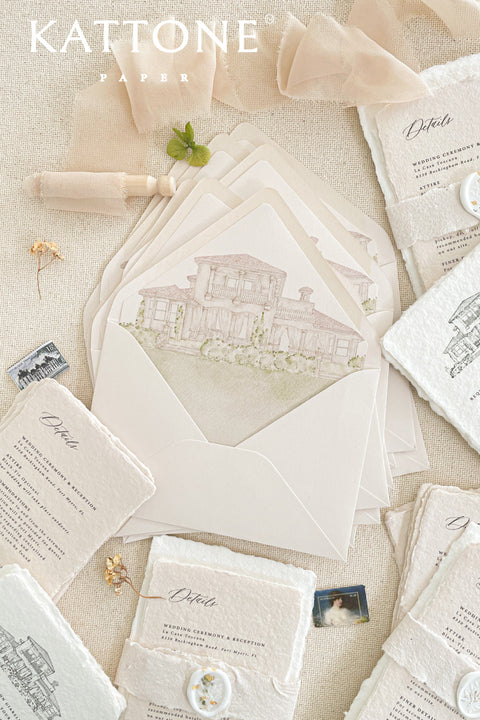 Stack of envelopes with watercolor venue liners visible, highlighting consistent artwork, clean cuts, and premium stationery quality.