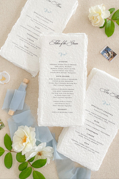 Add artisanal elegance to your wedding tables with our handmade paper wedding menus, crafted on luxurious cotton rag paper with naturally torn deckled edges. Each menu is printed with refined typography and delicate design elements, embodying the essence of fine-art minimalism. Perfect for romantic, garden, and destination weddings, these menus bring texture, warmth, and timeless sophistication to your reception setting.