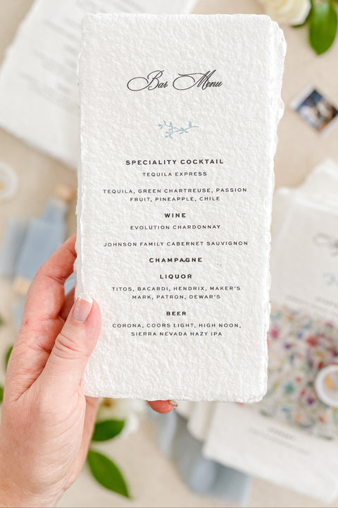 Add artisanal elegance to your wedding tables with our handmade paper wedding menus, crafted on luxurious cotton rag paper with naturally torn deckled edges. Each menu is printed with refined typography and delicate design elements, embodying the essence of fine-art minimalism. Perfect for romantic, garden, and destination weddings, these menus bring texture, warmth, and timeless sophistication to your reception setting.