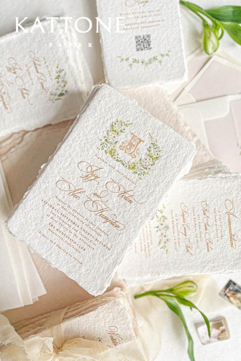 This exquisite deckle edge cotton rag suite offers a blend of natural elegance and personalized artistry. Perfect for a garden wedding, these beautiful invitations feature a bespoke watercolor design crest monogram created just for you. The luxurious, handmade paper adds a rich, organic texture, beautifully complementing the fine-art style of the crest and setting a romantic and sophisticated tone for your special day.
